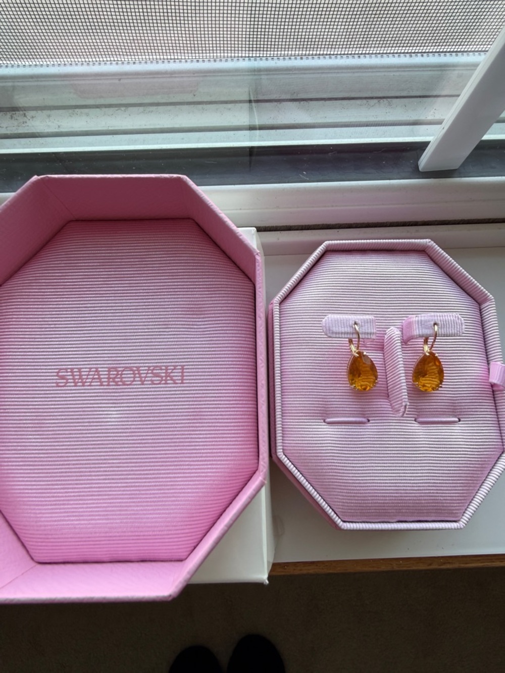Swarovski teardrop earrings. New! With a jewelry box. Good for gift!